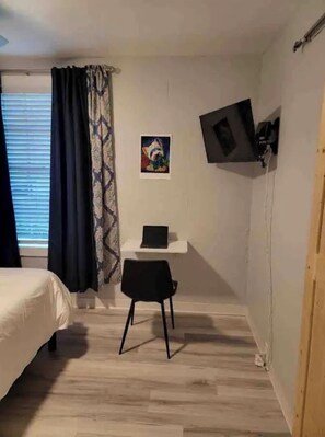 1 bedroom, desk, iron/ironing board, travel cot