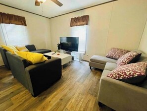 Living area - 2 bedroom cabin near the Lake with private hottub. (Lakeway)