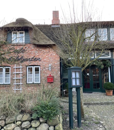 Ferienwohnung Apfelrose - Urlaub im Malerischen Inseldorf Oldsum