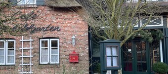 Ferienwohnung Apfelrose - Urlaub im Malerischen Inseldorf Oldsum