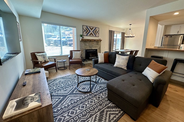 Open living area with futon/sofa bed.