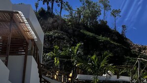 A modern building with a staircase leading to a terrace. -  10 min from the beach!Romantic Spanish apto w/Infinity Pool. (Las Terrenas)