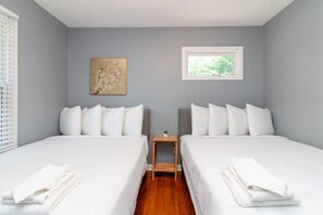 4 bedrooms, desk, iron/ironing board, travel cot