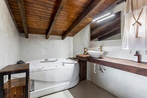 Bathtub, hair dryer, towels