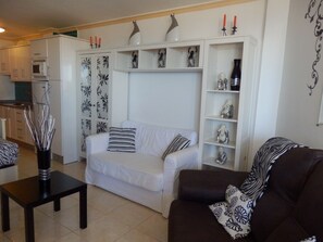TV - Studio Apartment "Deluxe El Faro" with Sea View, Shared Pool & Wi-Fi (Torrox Costa)