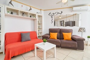 TV - Studio Apartment "Deluxe El Faro" with Sea View, Shared Pool & Wi-Fi (Torrox Costa)