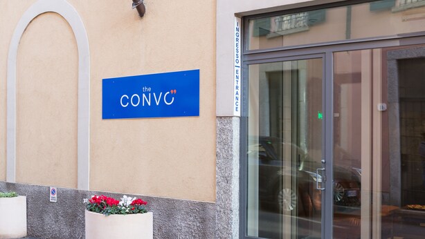 A building entrance with a blue sign reading "CONVO". -  The Convo Lake Como (Como)