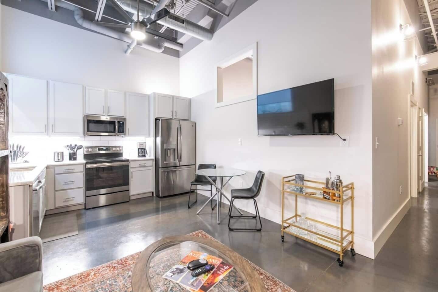 Fridge, coffee/tea maker, cookware/dishes/utensils