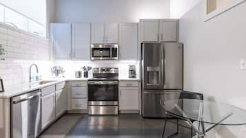 Fridge, coffee/tea maker, cookware/dishes/utensils