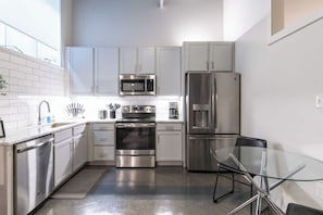 Fridge, coffee/tea maker, cookware/dishes/utensils