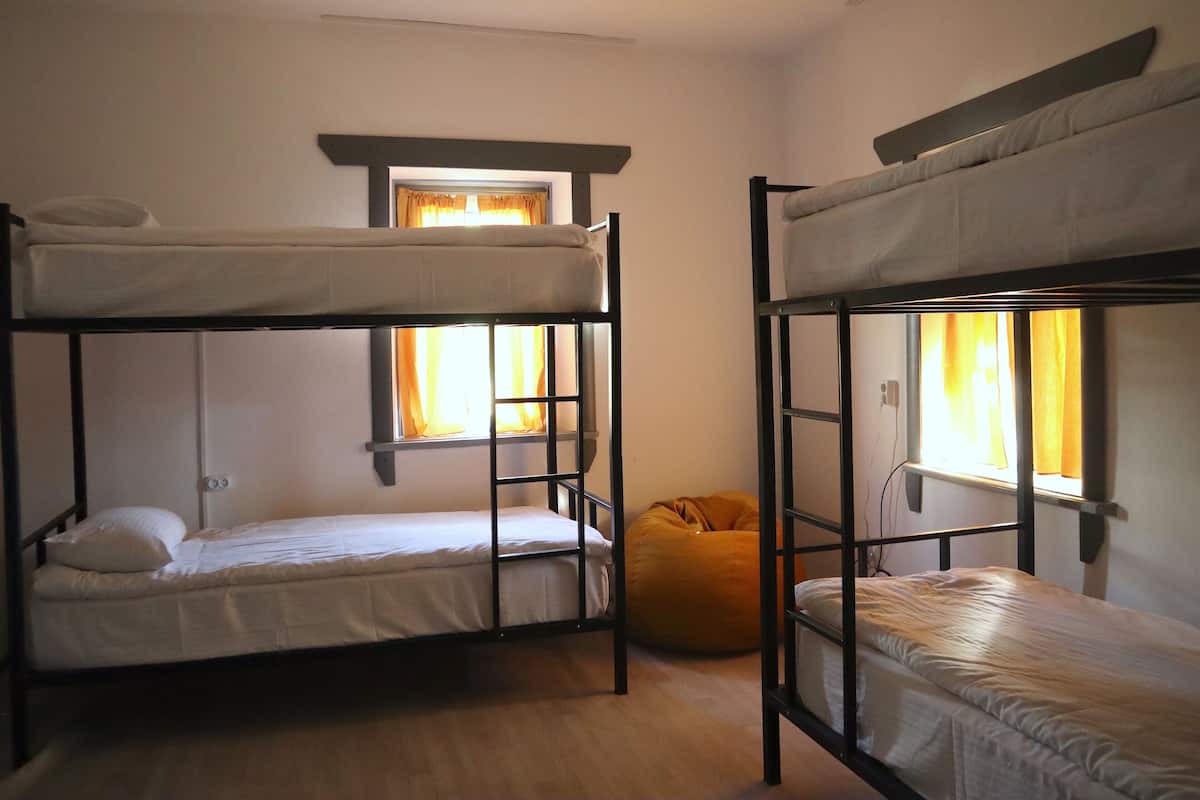 Laptop workspace, free WiFi, bed sheets