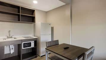 Suite, 1 Tempat Tidur King dengan tempat tidur Sofa, Bebas Asap Rokok | Wi-Fi gratis dan seprai linen