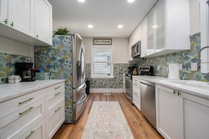 Fridge, microwave, oven, stovetop - Stylish 4BR Getaway! Minutes to Attractions! (Omaha)