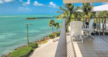 Clocked Out townhouse-style condo offering 2 bedrooms and 2.5 baths with pool & dockage