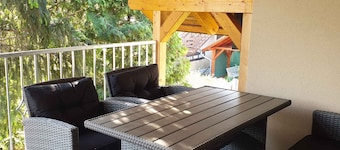 Holiday apartment with garden, pool and terrace