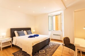 1 غرفة نوم ومكواة/لوح كي وواي فاي مجانًا وملاءات أسرّة