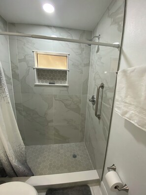 Hair dryer, towels, soap, toilet paper