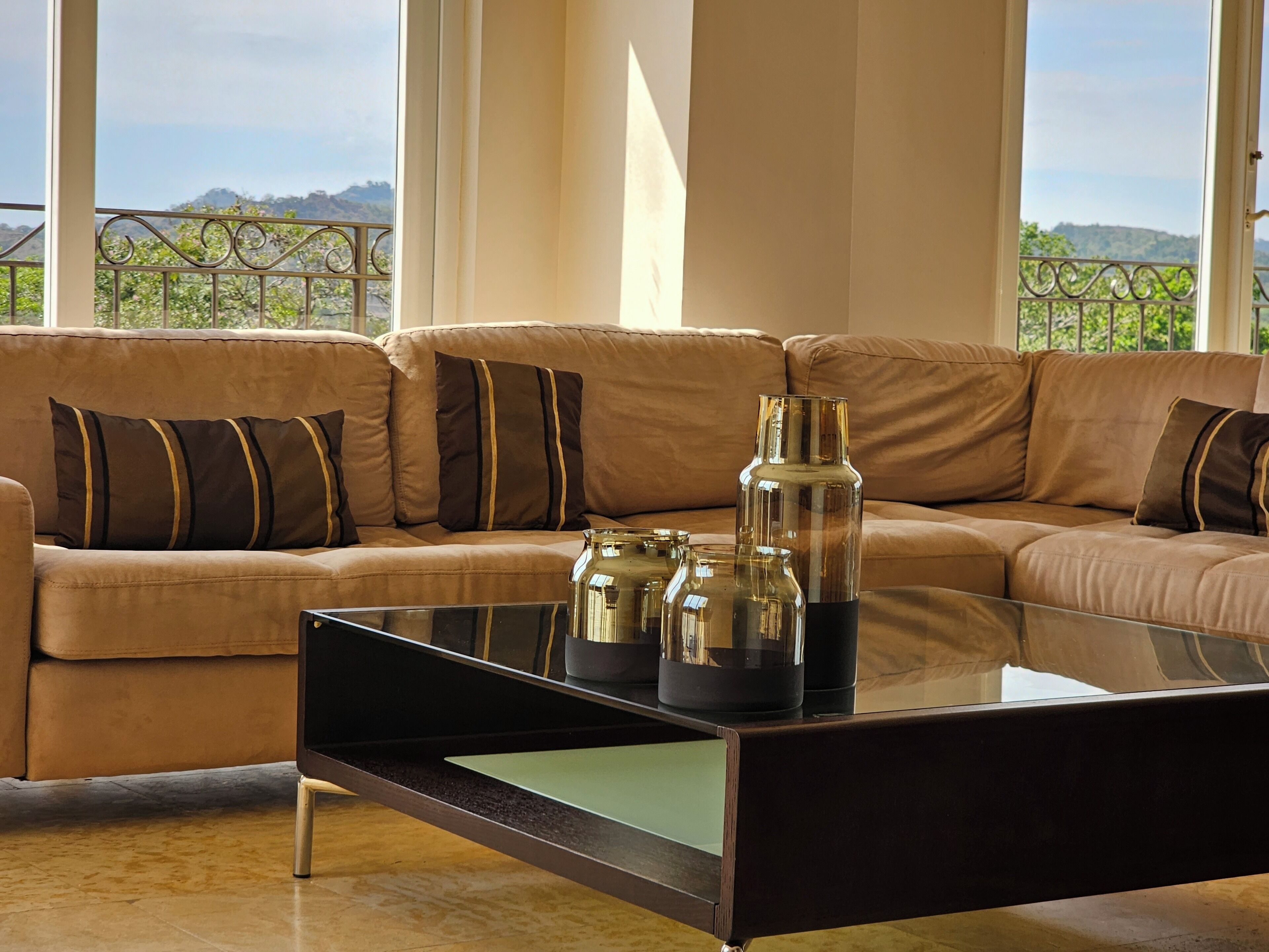Deluxe Condo | Living area | Flat-screen TV