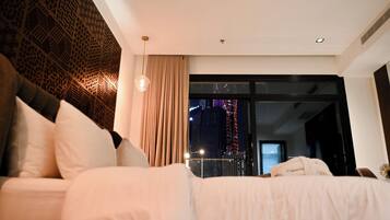 Suite with balcony | Minibar, in-room safe, iron/ironing board, free WiFi