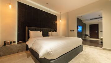 Junior Suite | Minibar, in-room safe, iron/ironing board, free WiFi