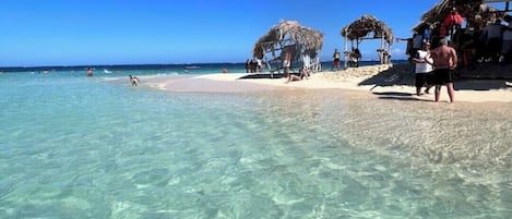 Ubicación a pie de playa y toallas de playa