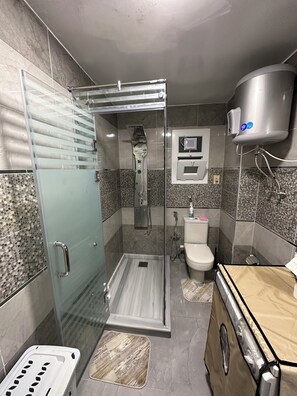 Hair dryer, towels, soap, shampoo