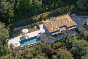 A house with a swimming pool, a covered patio, and a garden. - Elaia - Two Bedroom Villa, Sleeps 4 (Corfu)