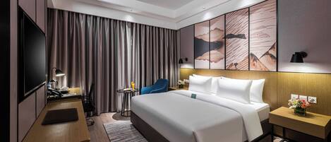 Suite executiva | 1 dormitori, minibar, caixa forta a l'habitació i escriptori