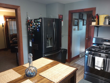 Interior. Cozy corner lot will provide a comfortable space for a couple or small family.