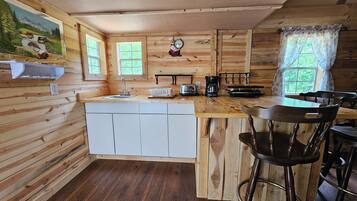 Fridge, microwave, coffee/tea maker, toaster