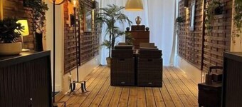 Appartement Avec Patio à en Plein Centre Ville