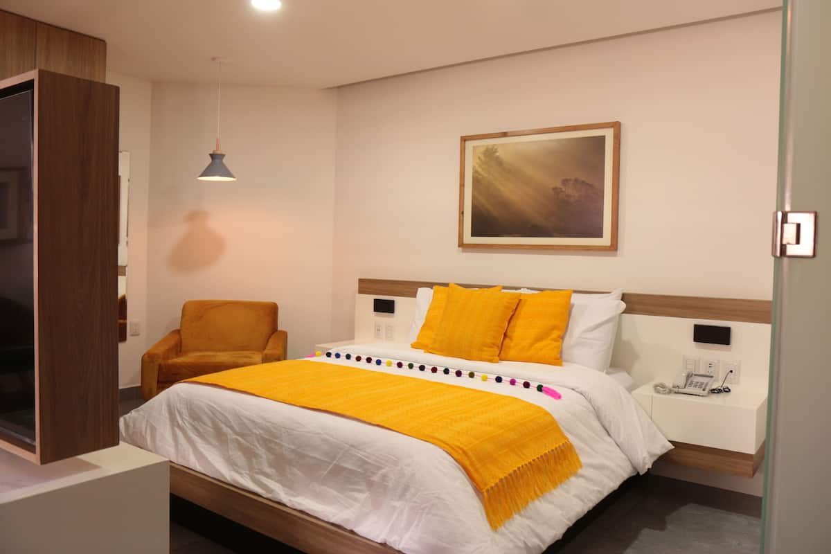 Comfort-studiosuite | Premium-sengetøj, dundyner, pengeskab på værelset