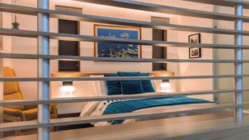 A modern bedroom with a bed, bedside tables, and a chair.