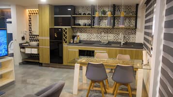 Superior Room | Private kitchen | Fridge, microwave, stovetop, coffee/tea maker