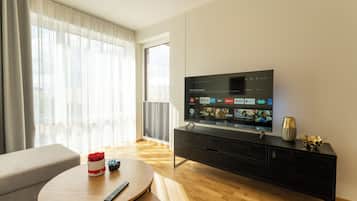 Apartament prèmium, 1 dormitori, no fumadors, vistes al pati | Sala d'estar