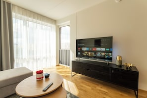 Apartamento premium, 1 quarto, para não fumantes, vista para o pátio | Área de estar