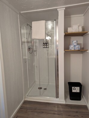 Adventure Cabin + Hot Tub at Loblolly Pines | Bathroom | Shower, free toiletries, hair dryer, towels