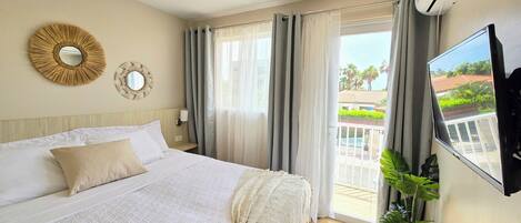 1 quarto, cofres nos quartos, ferros/tábuas de passar roupa