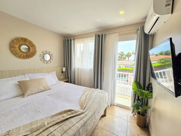 1 chambre, coffres-forts dans les chambres, fer et planche à repasser