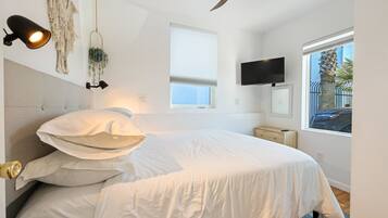 2 bedrooms, desk, iron/ironing board, travel crib