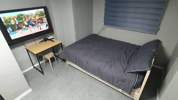 Deluxe Quadruple Room, 2 Double Beds | Soundproofing, free WiFi