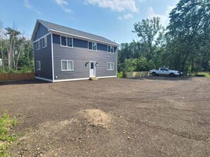 Exterior - 2023 Built Lake Home w/ beach, arcade & huge deck (Portage)