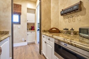 Fridge, microwave, toaster, dining tables