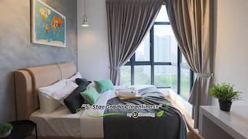 Egyptian cotton sheets, premium bedding, down duvets, laptop workspace