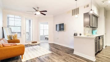 City Apartment | Living area | 50-inch Smart TV with digital channels, Netflix, Hulu