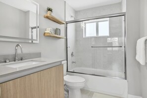 Hair dryer, towels, soap, shampoo