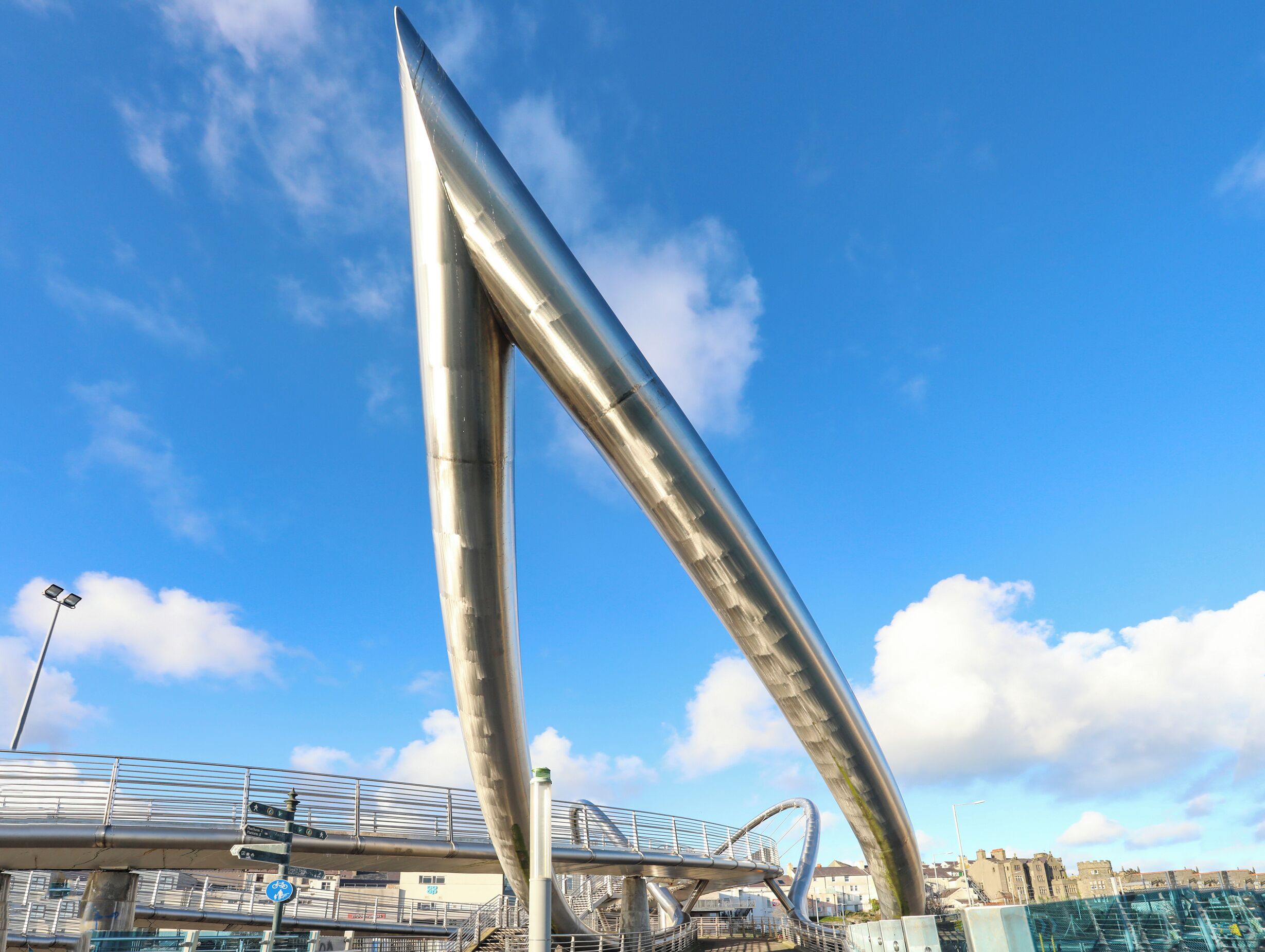 A modern bridge with a unique, curved design.