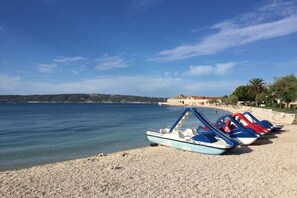 Guests can enjoy leisurely boat rides along the shore.