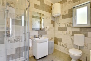 Regadera y secadora de cabello 