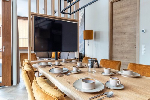 Appartement stylé avec sauna, domaine skiable à 600 m